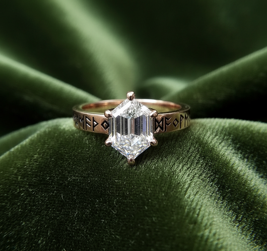 Frigg ring on dark olive velvet